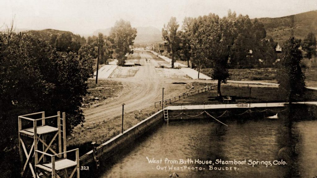 View of pool and main street of Steamboat Springs, Colorado in 1914.