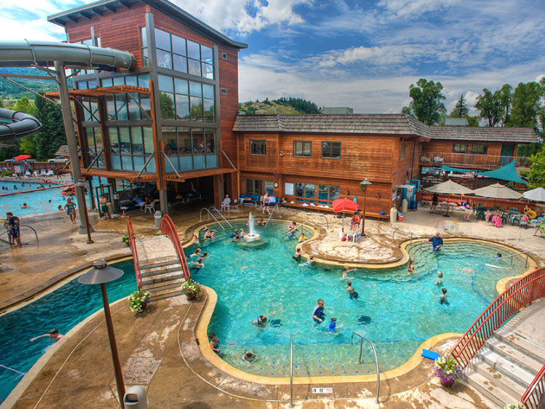 Aerial exterior view of pool and old facility building