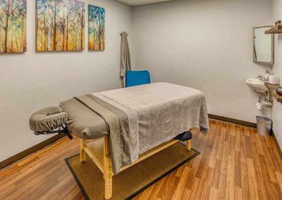 Massage therapy bed inside one of the rooms.